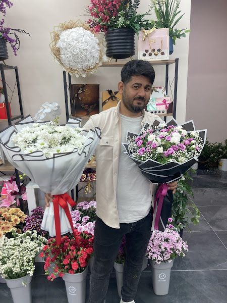 bir çiçek al